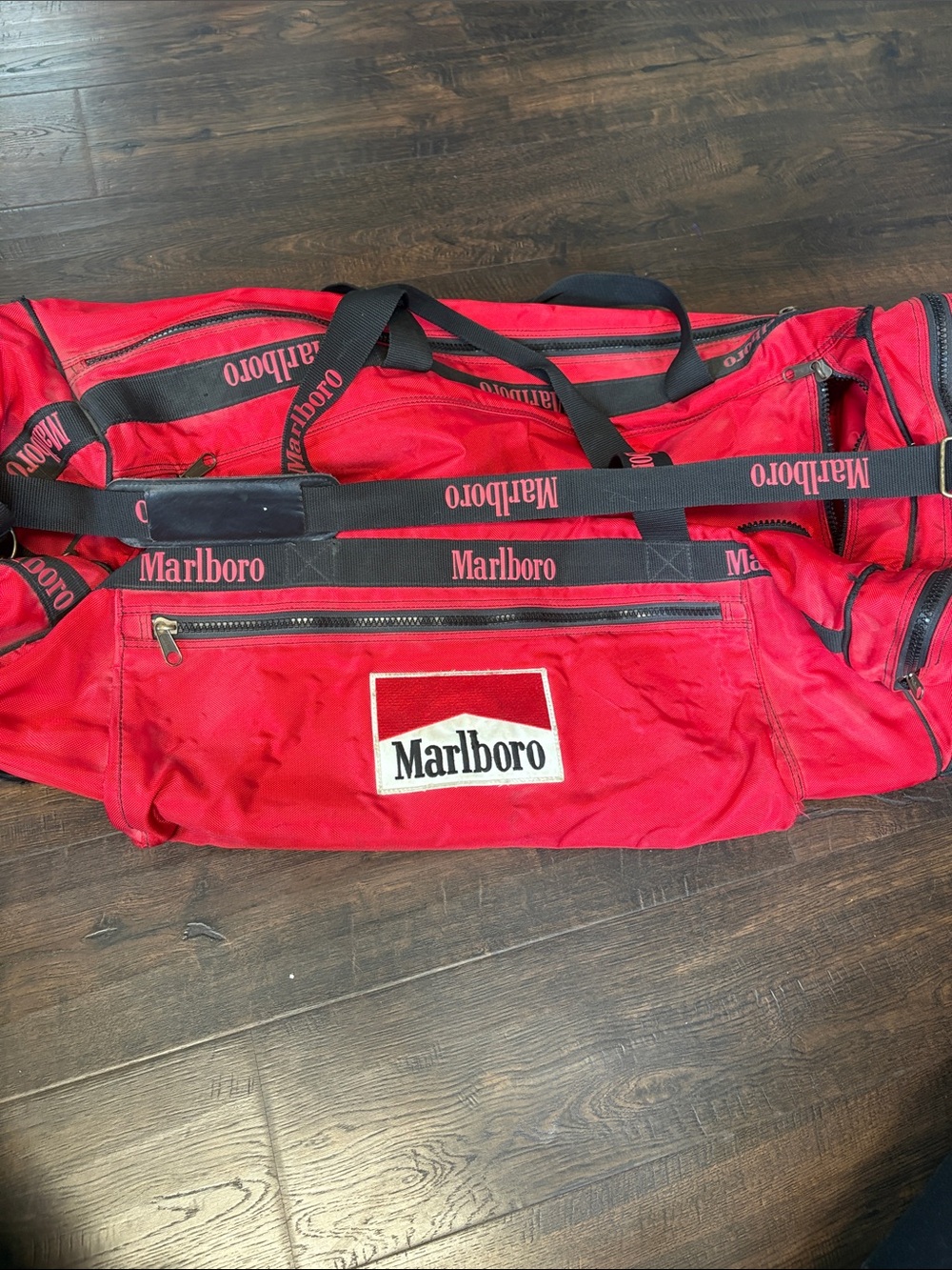 MARLBORO Vintage Red and Black Canvas Wheeled Duffel Bag with Logo Strap